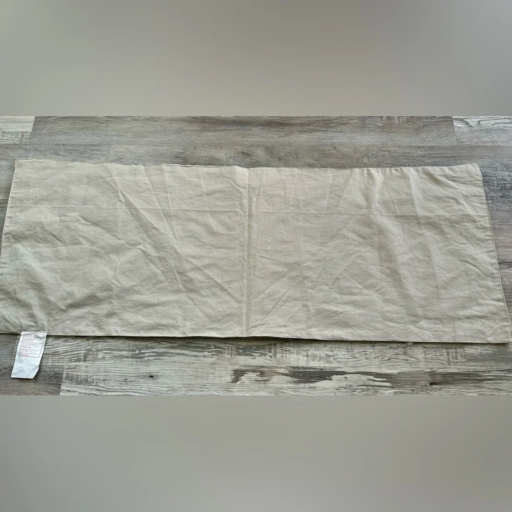 Pier 1 Imports taupe table runner with embroidered hexagon pattern
